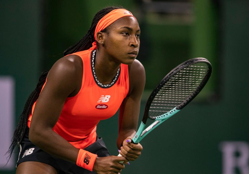 Coco Gauff of the United States gets ready for a point against Cristina Bucsa of Spain during their match at the BNP Paribas Open at the Indian Wells Tennis Garden in Indian Wells, Calif., Friday, March 10, 2023. 