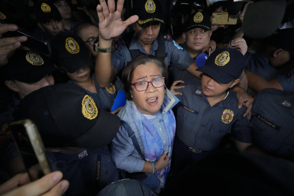 Former Senator Leila de Lima issues a statement to reporters after she goes out of the Muntinlupa City trial court on Monday, Nov. 13, 2023 in Muntinlupa, Philippines. A Philippine court on Monday ordered the release on bail of the former senator jailed more than six years ago on drug charges she said were fabricated to muzzle her investigation of then-President Rodrigo Duterte’s brutal crackdown on illegal drugs. Two other non-bailable drug cases against de Lima have been dismissed. (AP Photo/Aaron Favila)