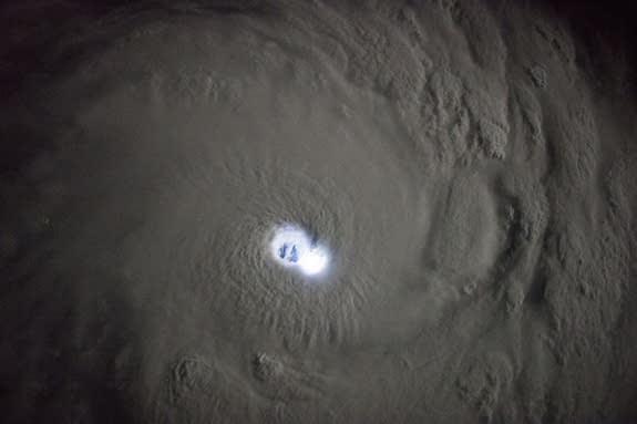 The cyclone’s gleaming eye as seen from the International Space Station on Jan. 12.