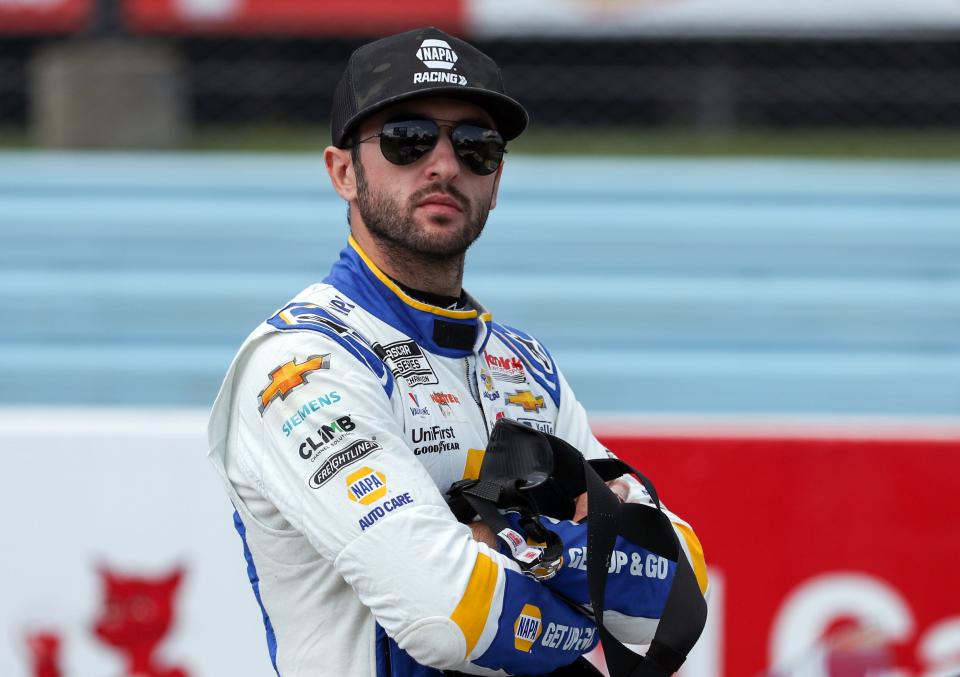 NASCAR Cup Series driver Chase Elliott stands on pit road during practice and qualifying for the Go Bowling at The Glen at Watkins Glen International on Aug. 19, 2023.