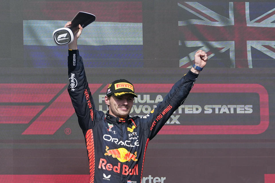 Red Bull driver Max Verstappen, of the Netherlands, celebrates on the podium after winning the Formula One U.S. Grand Prix auto race at Circuit of the Americas, Sunday, Oct. 22, 2023, in Austin, Texas. (AP Photo/Darron Cummings)