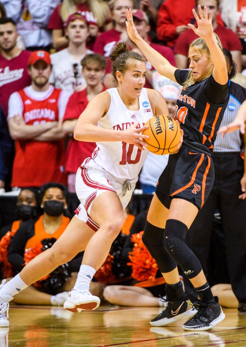 Indiana's Aleksa Gulbe (10) drives on Princeton's Ellie Mitchell (00) during the first half of the Indiana versus Princeton women's NCAA second round game at Simon Skjodt Assembly Hall on Monday, March 21, 2022.