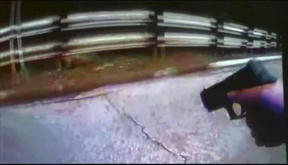 University of Cincinnati police officer Ray Tensing's body camera shows his handgun drawn after driver Samuel Dubose was pulled over and shot during a traffic stop in Cincinnati, Ohio July 19, 2015, in a still image from video released by the Hamilton County Prosecutor's Office on July 29, 2015. A University of Cincinnati police officer who fatally shot an unarmed black man has been charged with murder after a grand jury investigation, the Hamilton County prosecutor said on Wednesday. (REUTERS/Hamilton County Prosecutor's Office/Handout)