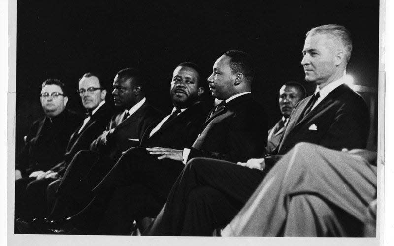 G. Homer Durham, Martin Luther King, Jr., Ralph Abernathy, an unidentified participant, Rev. Louis Eaton, and Msgr. Robert Donahoe at Goodwin Stadium, Arizona State University. King spoke earlier in the day at Tanner Chapel A.M.E. Church.