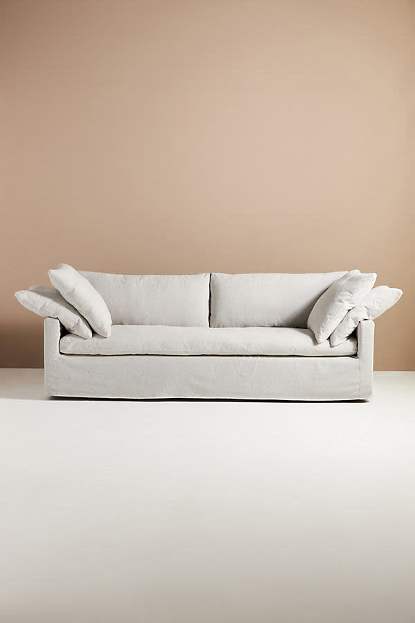 <p><a href="https://go.redirectingat.com?id=74968X1596630&url=https%3A%2F%2Fwww.anthropologie.com%2Fanthroliving%2Fshop%2Fupcycled-wells-slipcover-sofa%3Fcolor%3D004%26size%3DM&sref=https%3A%2F%2Fwww.harpersbazaar.com%2Ffashion%2Ftrends%2Fg44565243%2Fmost-comfortable-couches%2F" rel="nofollow noopener" target="_blank" data-ylk="slk:Shop Now;elm:context_link;itc:0;sec:content-canvas" class="link ">Shop Now</a></p><p>Upcycled Wells Slipcover Sofa</p><p>$1998.00</p><p>anthropologie.com</p>