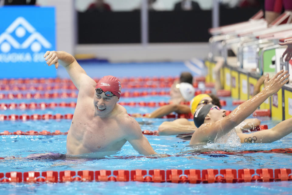 Tom Dean of Britain celebrates after winning the men's 4x200m freestyle relay final at the World Swimming Championships in Fukuoka, Japan, Friday, July 28, 2023. (AP Photo/Eugene Hoshiko)