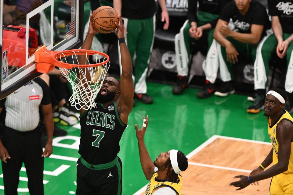 Boston Celtics guard Jaylen Brown dunks the ball during the first half of Game 2 against the Indiana Pacers.