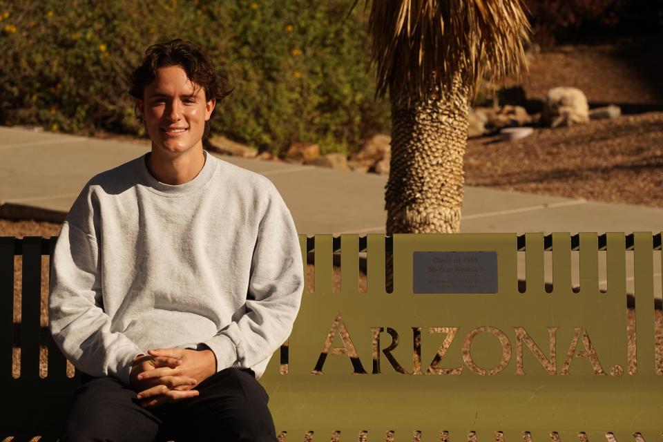 Aidan Pettit-Miller, 23, a public health student at the University of Arizona, at the University of Arizona main campus in Tucson on Thursday, Dec. 8, 2022.