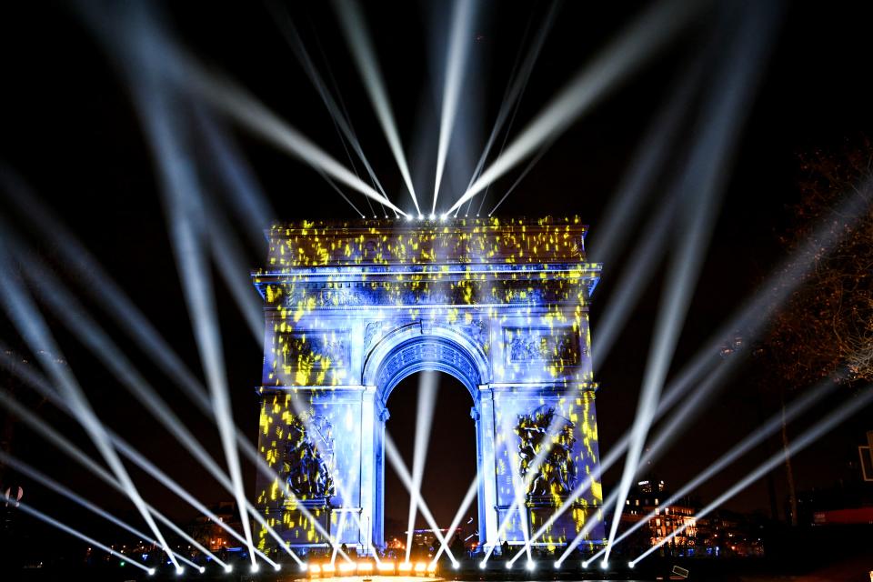 The Arc de Triomphe illuminated for the New Year celebrations (AFP via Getty Images)