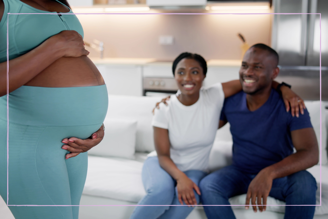  Surrogate Mother In Front Of Happy African Couple. 