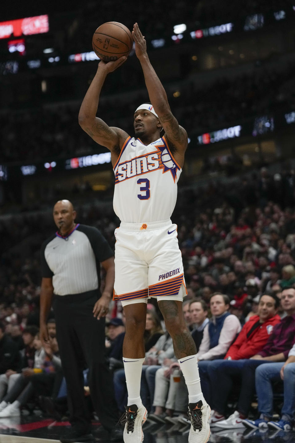 Phoenix Suns guard Bradley Beal sinks a three-point shot during the first half of an NBA basketball game against the Chicago Bulls, Wednesday, Nov. 8, 2023, in Chicago. (AP Photo/Erin Hooley)