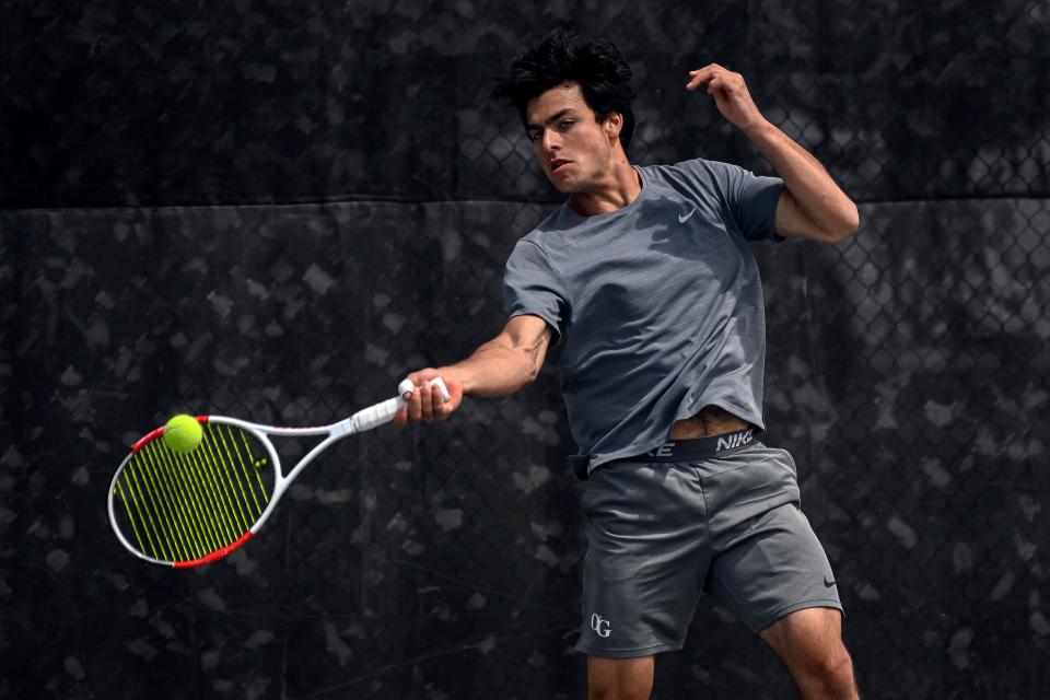 Sioux Falls O'Gorman's Alexander Lupo returns a serve in flight 1 singles action during day one of the Class AA state tournament on Thursday at Sioux Park in Rapid City.