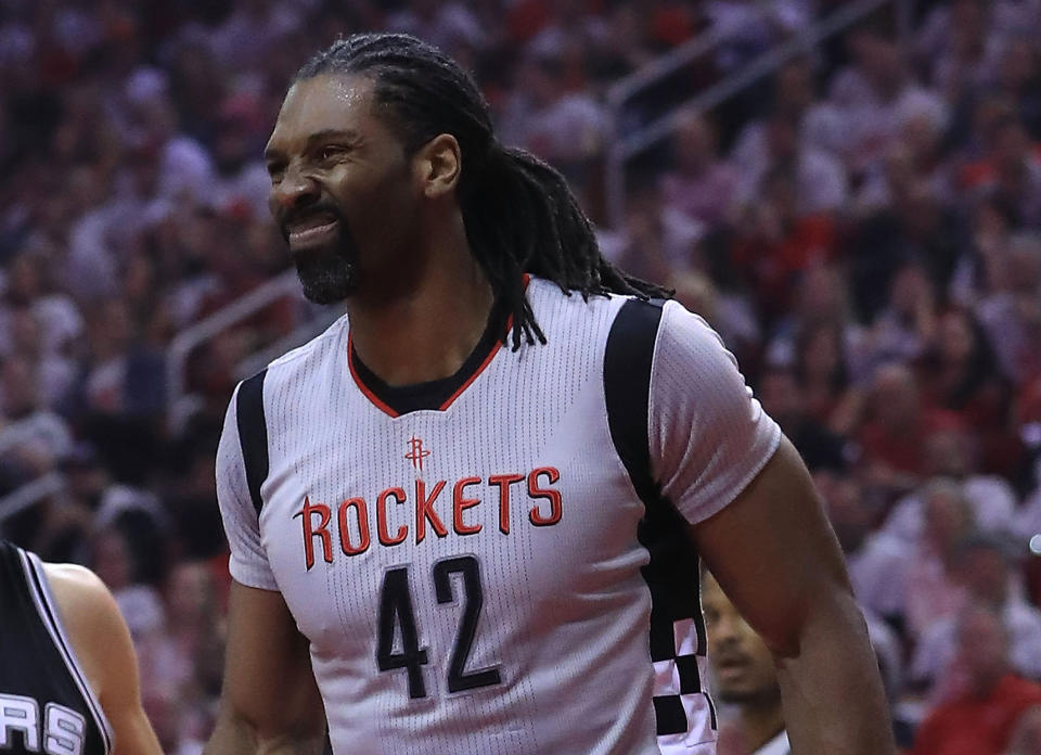 Nene knew something had gone wrong early in Game 4. (Getty Images)