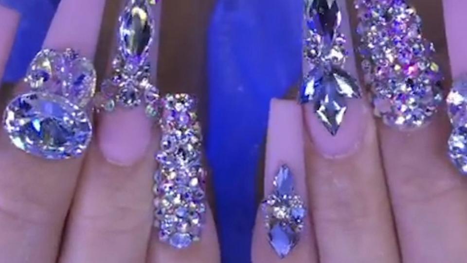 Manicurist's over-the-top bejeweled nails are a whole new art form