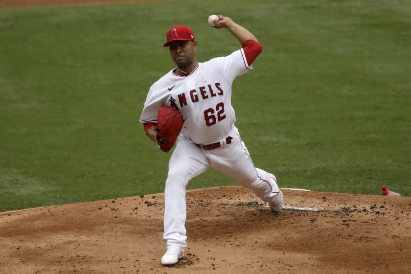Los Angeles Angels starting pitcher Jose Quintana throws to a Los Angeles Dodgers batter.