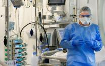 A member of the medical personnel wearing a full protective suit works in the intensive care unit at Maastricht UMC+ Hospital