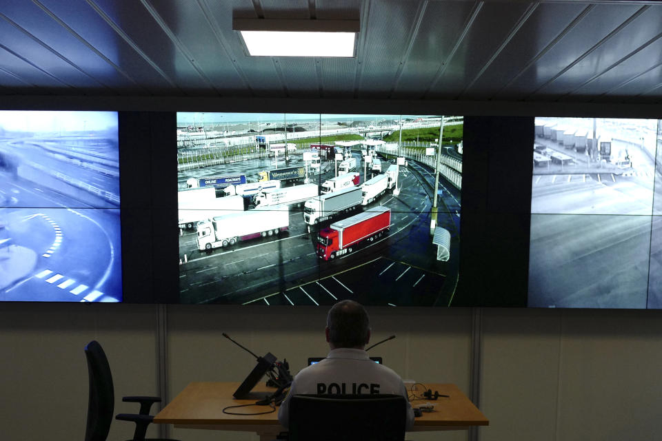A member of the Air and Frontier police department watches screens in the Police control room of Eurotunnel in Coquelles, northern France, Wednesday, Jan 16, 2019. A top French border police official says that migrants may fear the consequences of Brexit but checks for illegal border crossings won't change - but likely will for British. (AP Photo/Michel Spingler)