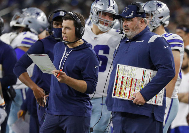 Dallas Cowboys head coach Mike McCarthy, left, and offensive coordinator  Kellen Moore, right watch from the sidelines during an NFL Football game  against the Houston Texans in Arlington, Texas, Saturday, Aug. 21