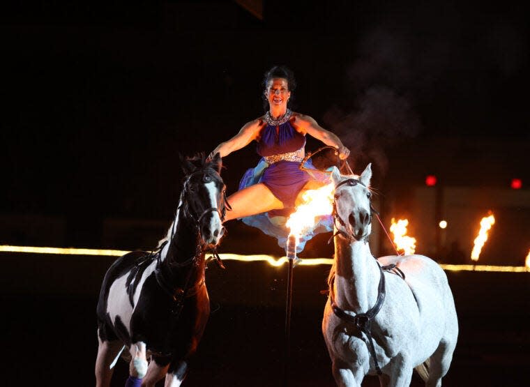 Dusti Dickerson gives an incredible and fiery performance during "Fantasia," Equine Affaire’s musical celebration of the horse.