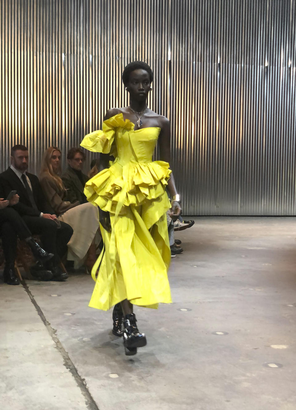 A model walks the runway wearing fashion from the Alexander McQueen Autumn/Winter 2022 collection on Tuesday, March 15, 2022 in New York. (AP Photo/Leanne Italie)