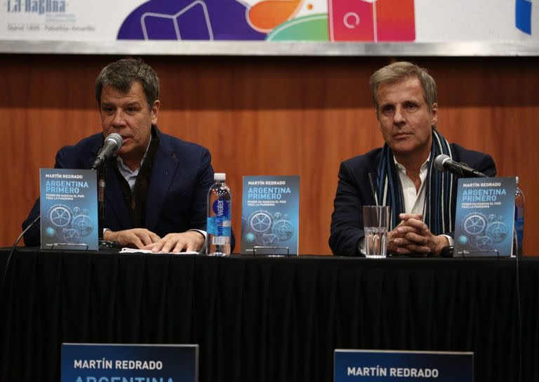 Facundo Manes y Martín Redrado, en la Feria del Libro de Buenos Aires