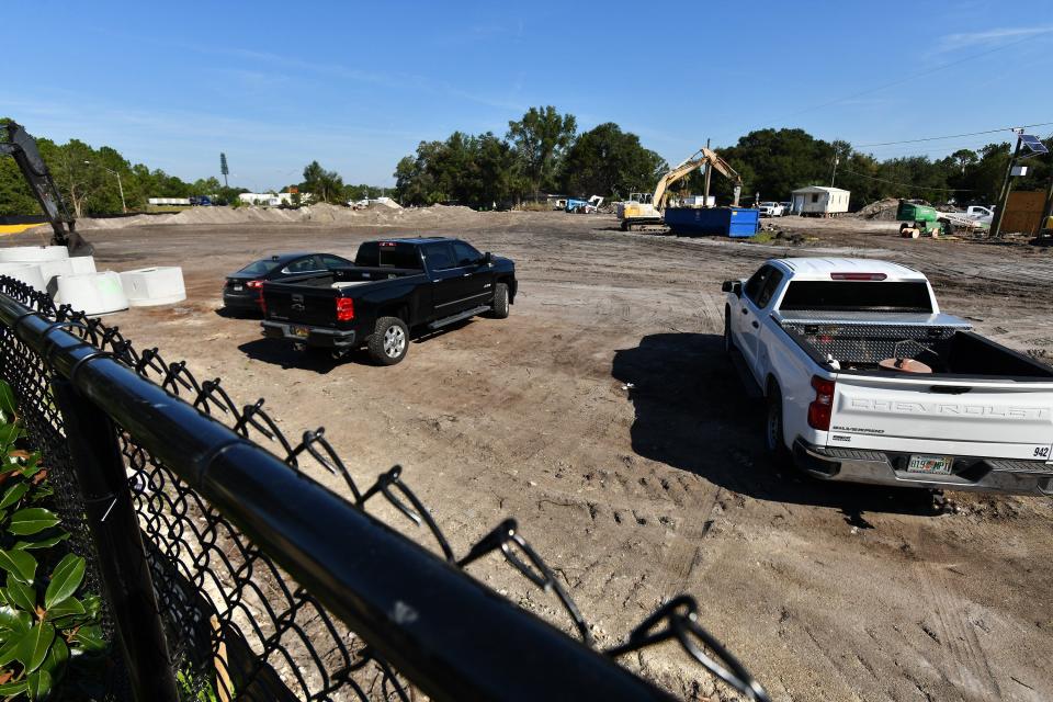 The view over the construction fence of the site fir the new Medical Examiner's Office shows the area that was cleared of trees in the Brentwood neighborhood to make way for the building.