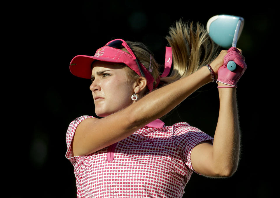 Lexi Thompson watches her tee shot on the 16th hole during the third round of the Kraft Nabisco Championship golf tournament on Saturday, April 5, 2014 in Rancho Mirage, Calif. (AP Photo/Chris Carlson)