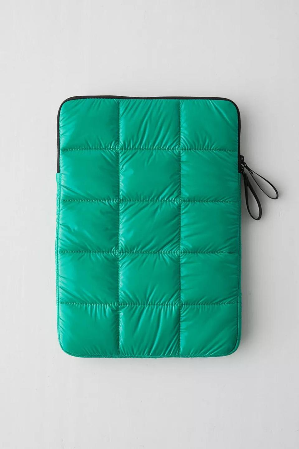 <p><a href="https://go.redirectingat.com?id=74968X1596630&url=http%3A%2F%2Fwww.urbanoutfitters.com%2Fshop%2Fuo-puffer-laptop-sleeve&sref=https%3A%2F%2Fwww.bestproducts.com%2Flifestyle%2Fnews%2Fg2100%2Fperfect-gift-ideas-under-100%2F" rel="nofollow noopener" target="_blank" data-ylk="slk:Shop Now;elm:context_link;itc:0;sec:content-canvas" class="link ">Shop Now</a></p><p>Puffer Laptop Sleeve</p><p>urbanoutfitters.com</p><p>$26.00</p><span class="copyright">Urban Outfitters</span>