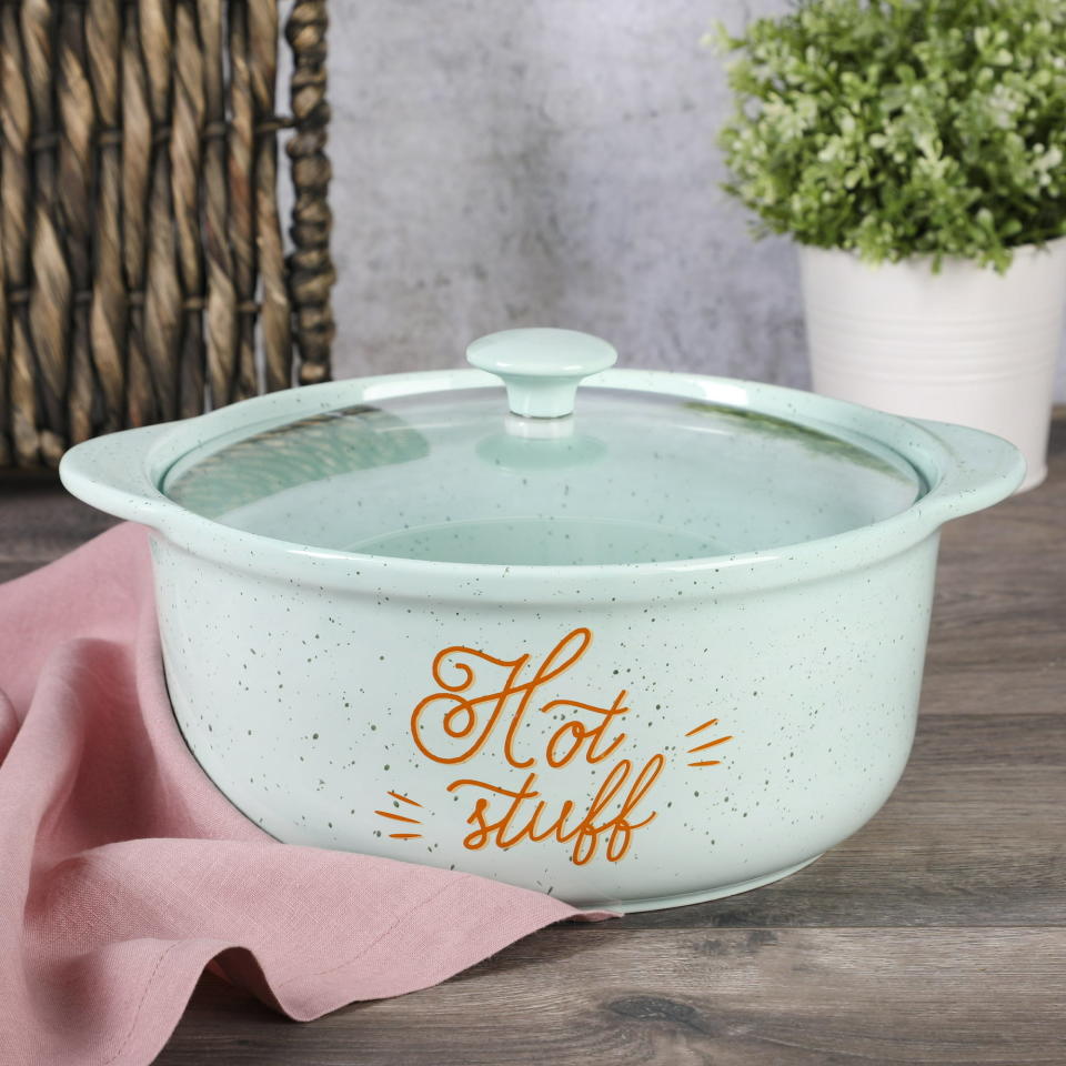 the casserole dish that reads hot stuff in handwritten lettering