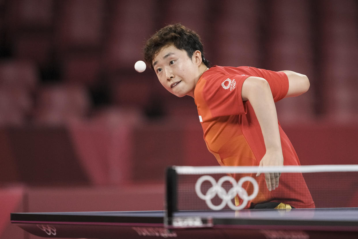 Singapore paddler Feng Tianwei in action against Spain's Maria Xiao in the women's singles competition at the 2020 Tokyo Olympics. (PHOTO: SNOC / Kong Chong Yew)