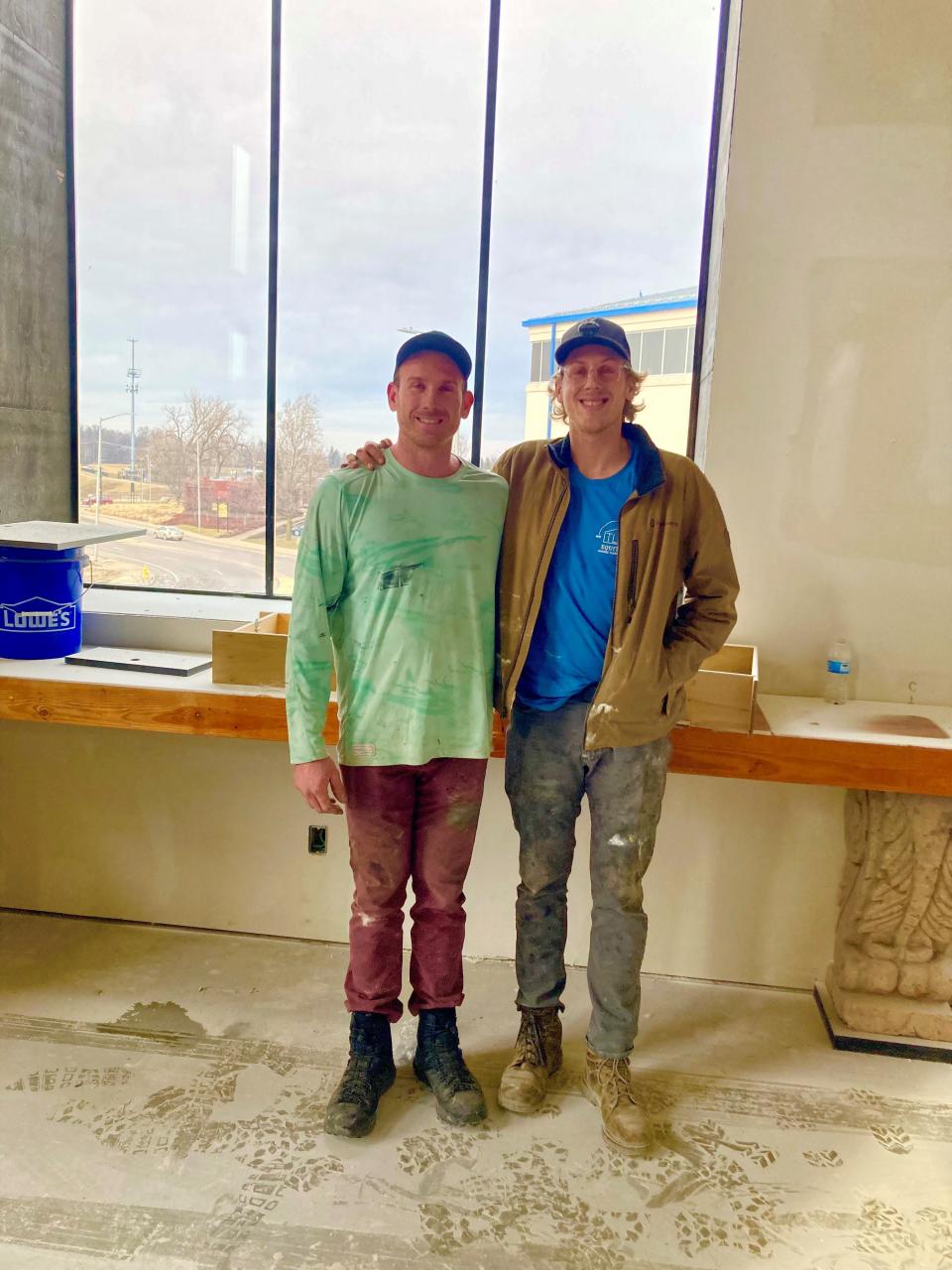 Matt and Michael Jennings stand in the space that will be their father's condominium when the work converting the former Delaware County Justice Center to luxury dwellings is completed. The work has been ongoing for more than a year. The brother say now it should be finished by the end of 2023.