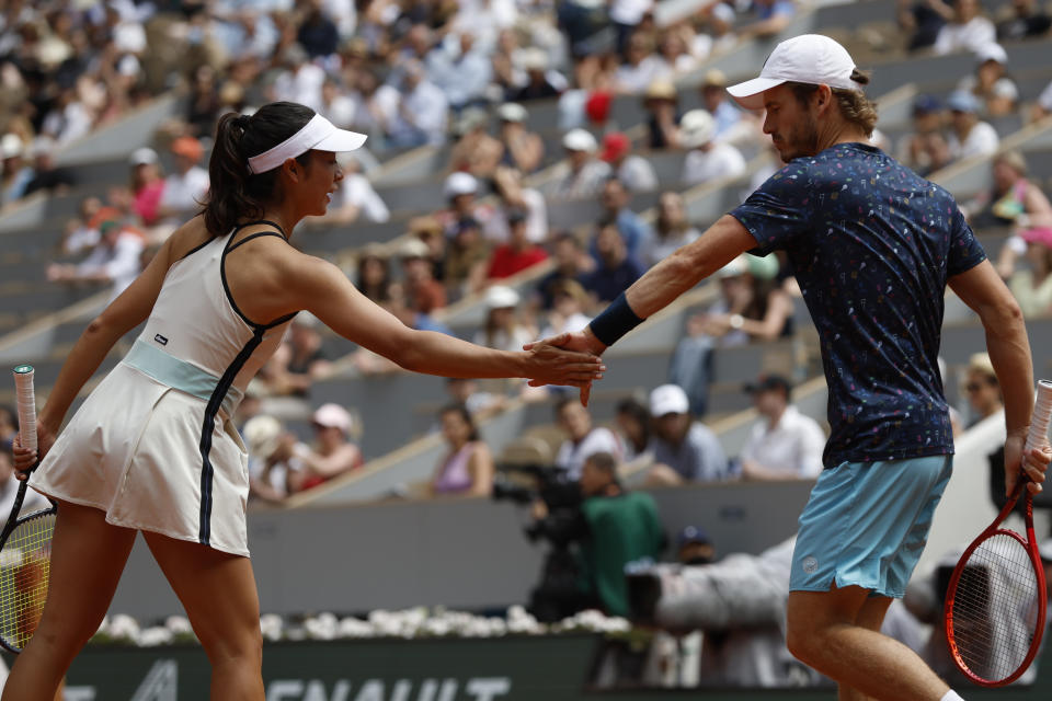 Japan's Ena Shibahara, left, and Netherlands' Wesley Koolhof celebrate winning point as they play Belgium's Joran Vliegen, right, and Norway's Ulrikke Eikeri during their Mixed Doubles final of the French Open tennis tournament at the Roland Garros stadium Thursday, June 2, 2022 in Paris. (AP Photo/Jean-Francois Badias)