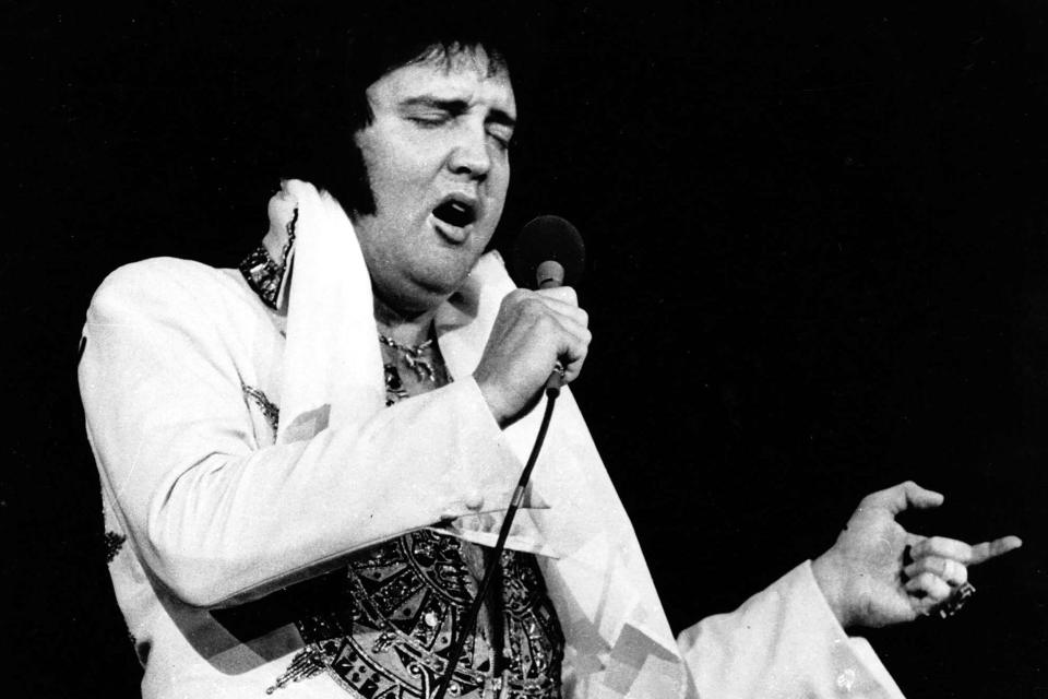 Elvis Presley performs on May 23, 1977, just months before his death.