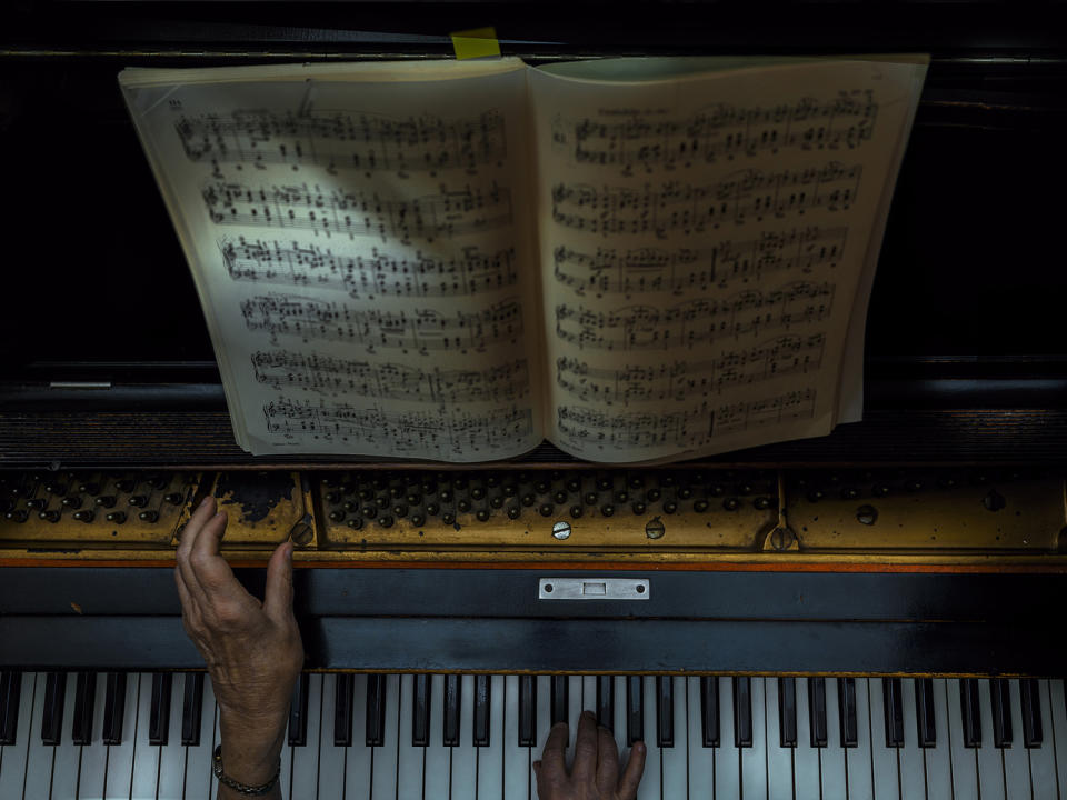 <p><strong>Martha — pianist</strong><br> Sanwal said: “I have always had a fascination with desks and workspaces. I thought that looking at different workspaces throughout the world might be a good way to get my message across.” (Photo: Sanwal Deen/Caters News) </p>