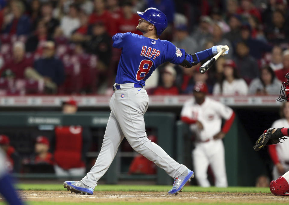 Chicago Cubs' Ian Happ watches his three-run home run against the Cincinnati Reds during the seventh inning of a baseball game in Cincinnati, Monday, May 23, 2022. (AP Photo/Paul Vernon)