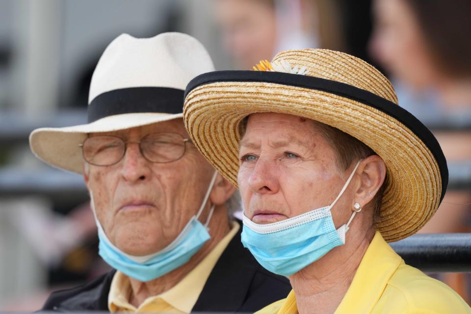 May 14, 2021; Baltimore, Maryland, USA; Spectators dress for Black-Eyed Susan Day while following COVID protocols at Pimlico Race Course. Mandatory Credit: Mitch Stringer-USA TODAY Sports