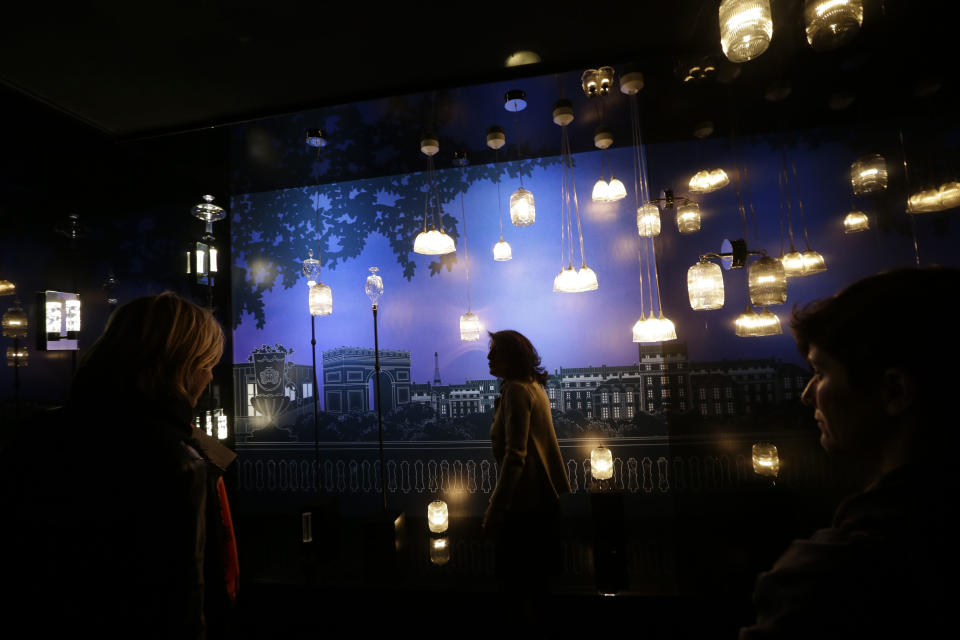 Lamps designed by French conceptual artist Yann Kersale' are displayed at Milan's Design Fair, in Milan, Italy, Thursday, April 11, 2013. The Milan furniture and design week fair, showcasing the latest in furniture and design from countries around the world, will continue until Sunday. (AP Photo/Luca Bruno)