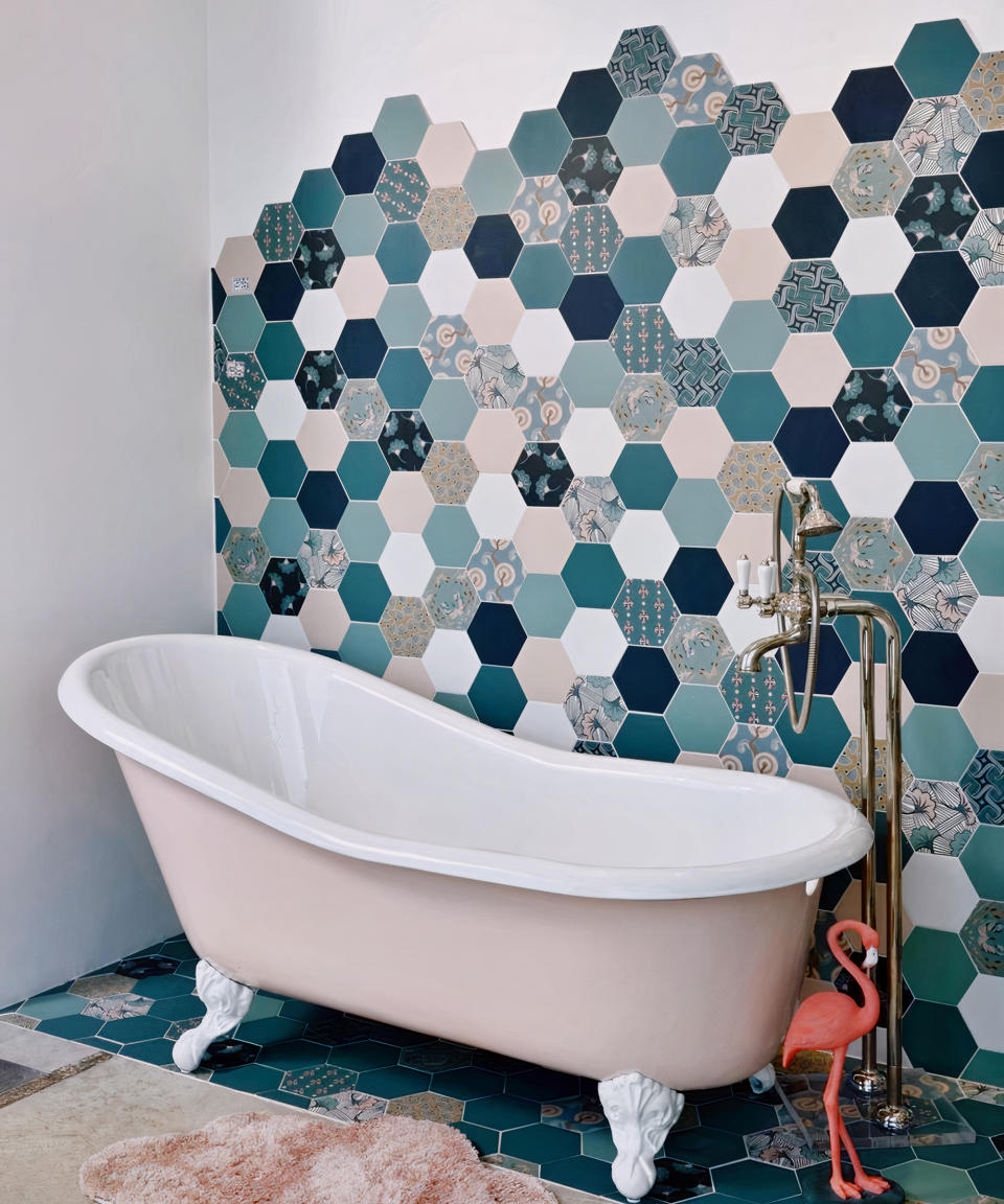 <p> Give your modern farmhouse bathroom added impact with an eye-catching patchwork effect of patterned and color block wall tiles. For a modern bathroom tile idea, take shapely tiles from the floor, and continue up the wall, with a ‘broken border’ finish.  </p> <p> Dunne says: ‘Decorative wall tiles can be used to bring a sense of charm and style to your farmhouse bathroom or kitchen design, by adding a contemporary touch with a classic feel.’ </p>