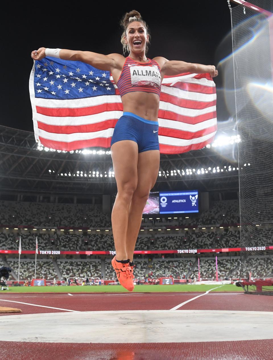 Valarie Allman celebrated after winning the discus gold.