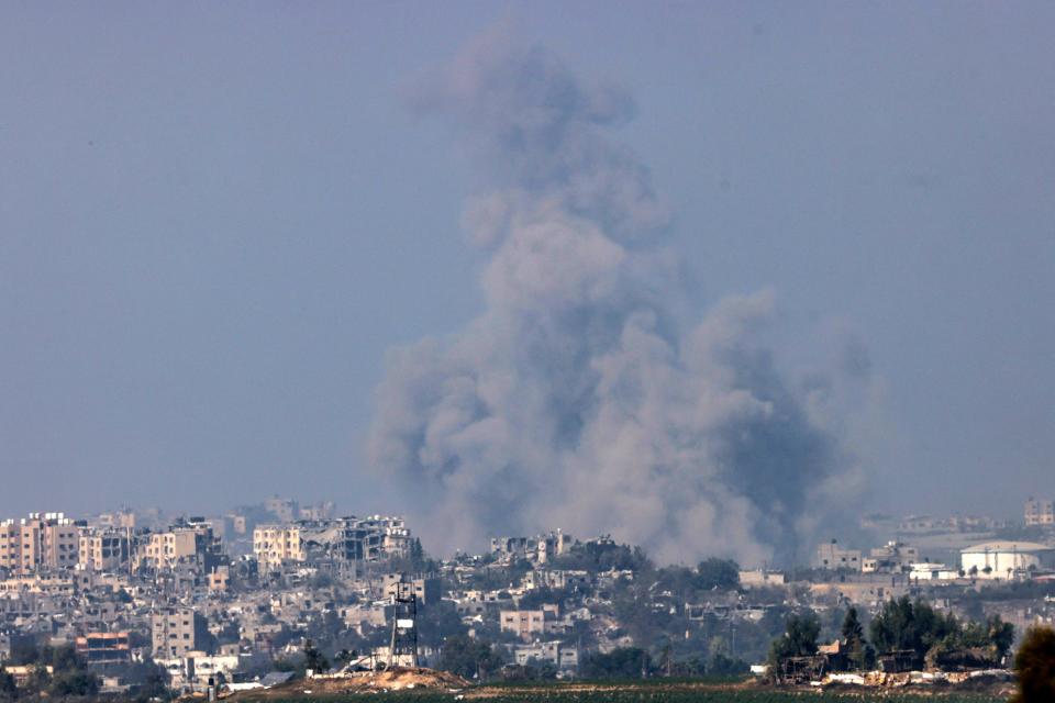 A picture taken from the southern Israeli city of Sderot shows smoke ascending over the northern Gaza Strip following an Israeli strike on Oct. 25, 2023, amid the ongoing battles between Israel and the Palestinian group Hamas.