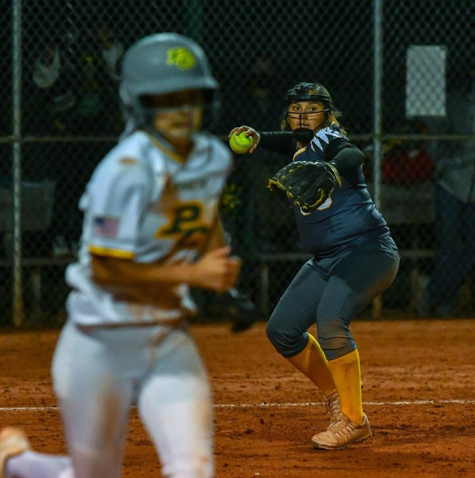 Pueblo East's Marisa Gonzales, right, tries to throw out the Pueblo County runner in the seventh inning Thursday, Sept. 10, 2020, on Salas Field at the Runyon Sports Complex.