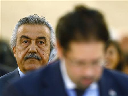 Syrian ambassador to the United Nations Faysal Khabbaz Hamoui attends the Human Rights Council meeting in Geneva September 16, 2013. REUTERS/Ruben Sprich