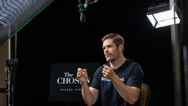 Dallas Jenkin, creator, producer, writer and director of “The Chosen,” talks to news media at the Salvation Army’s Camp Hoblitzelle in Midlothian, Texas, on Aug. 15, 2022.