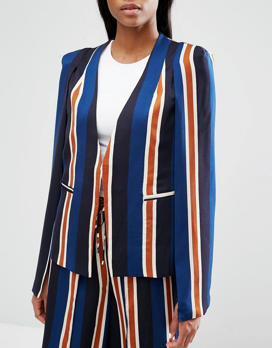 <a href="http://us.asos.com/Lavish-Alice-Cape-Blazer/1a27z5/?iid=6629955&amp;clr=Stripe&amp;cid=11896&amp;pgesize=36&amp;pge=0&amp;totalstyles=90&amp;gridsize=3&amp;gridrow=6&amp;gridcolumn=2&amp;mporgp=L2xhdmlzaC1hbGljZS9sYXZpc2gtYWxpY2UtY2FwZS1ibGF6ZXIvcHJvZC8." target="_blank">Asos</a> Lavish Alice Cape Blazer, $88