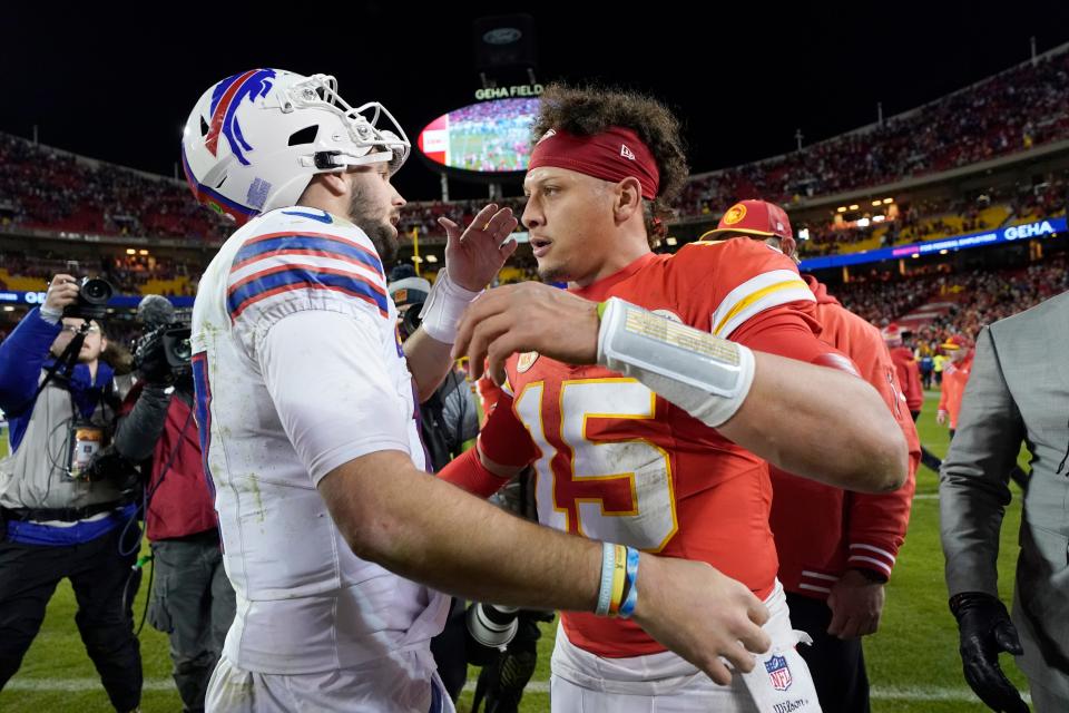 Buffalo Bills quarterback Josh Allen, left, and Kansas City Chiefs quarterback Patrick Mahomes (15) shake hands following an NFL football game Sunday, Dec. 10, 2023, in Kansas City, Mo.