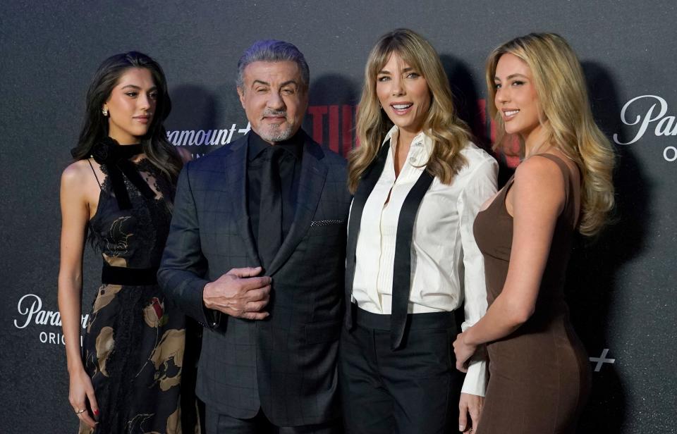 US actor Sylvester Stallone, his wife Jennifer Flavin and daughters Sophia Stallone (L) and Sistine Stallone (R) attend the Season 1 premiere of Paramount+ series 