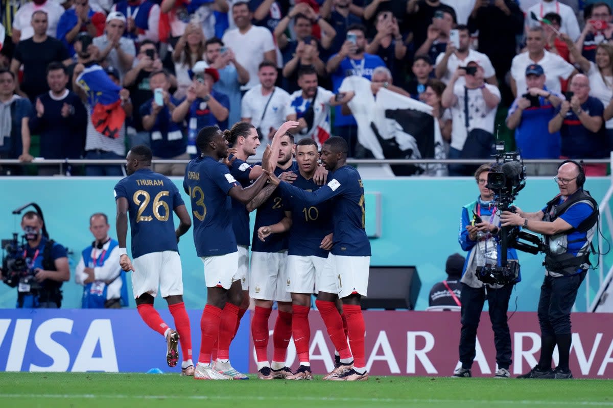 Kylian Mbappe celebrates after scoring in France’s 2-0 win over Poland (Peter Byrne/PA) (PA Wire)