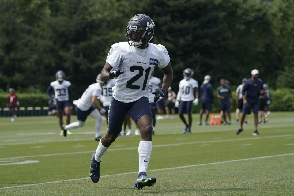 Seattle Seahawks cornerback Artie Burns runs a drill during NFL football practice on Aug. 1, 2022, in Renton, Wash. (AP Photo/Ted S. Warren)