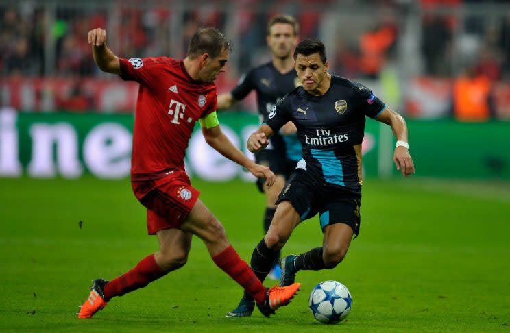 Philipp Lahm and Alexis Sanchez