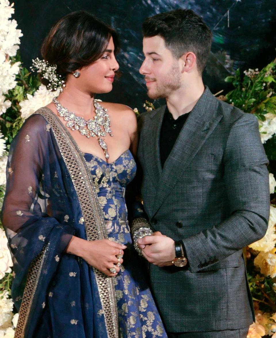 Celebrating alongside husband Nick Jonas, Priyanka Chopra chose an romantic updo with a surprising twist in the back.